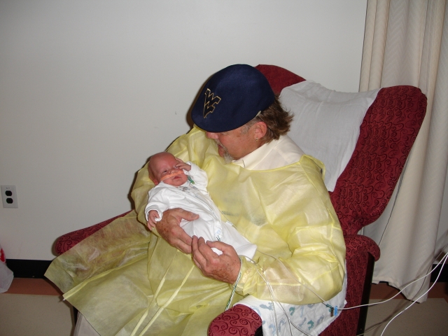 Mr. C and grandchild number six. Taken February 2006.