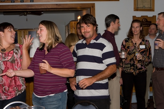 The girl and the guy in stripes....does ANYONE know who they are????  Not a clue....